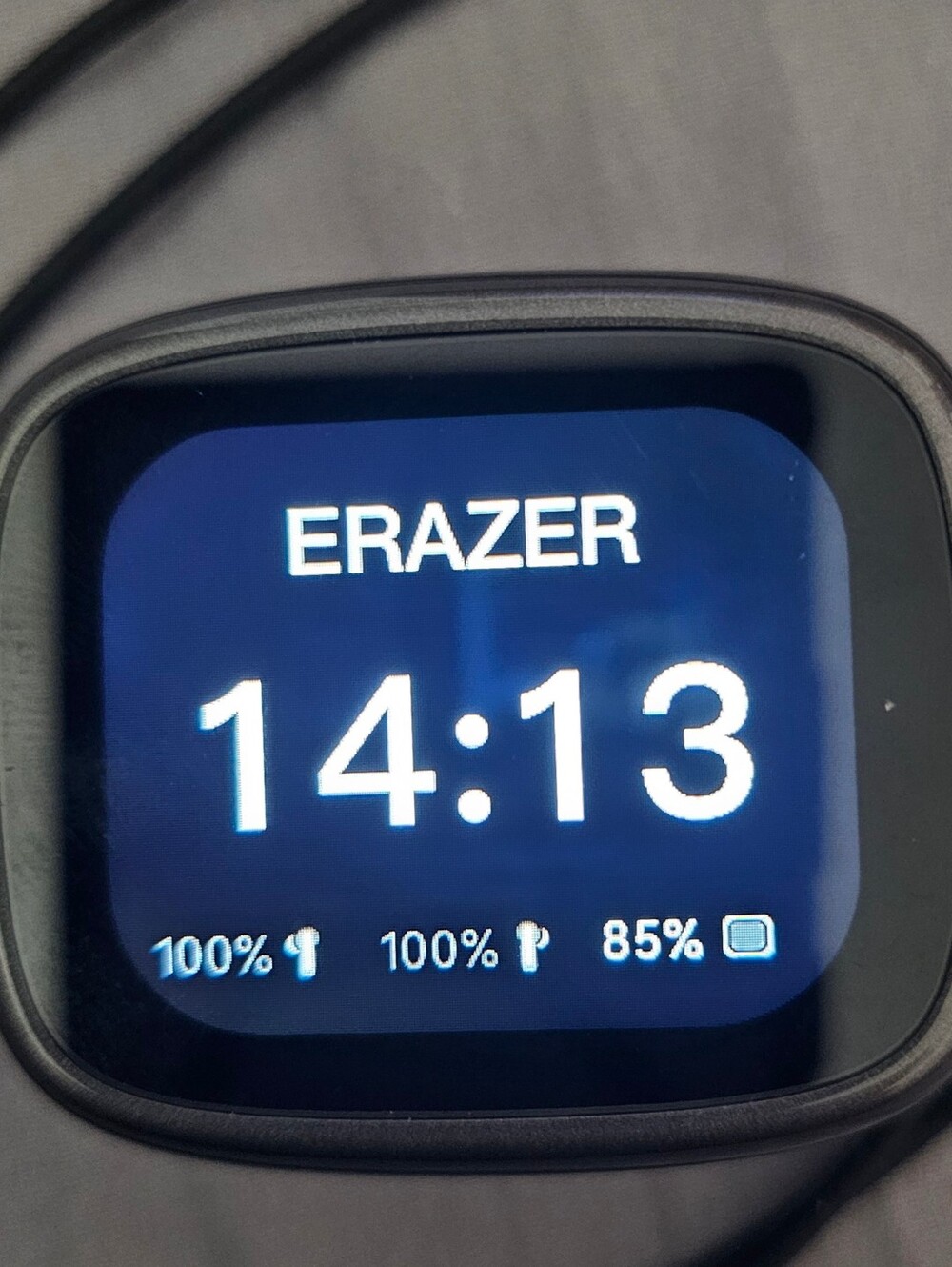 ERAZER XF28 open ear translation earbuds with a smart touchscreen charging case.